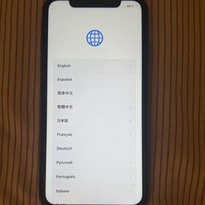 iPhone 11 with case and a charger